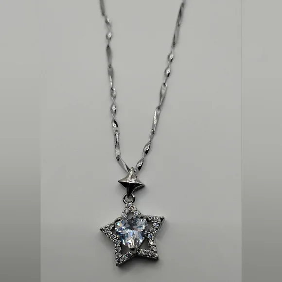 Elegant Silver Star Pendant Necklace - Picture 2 of 7